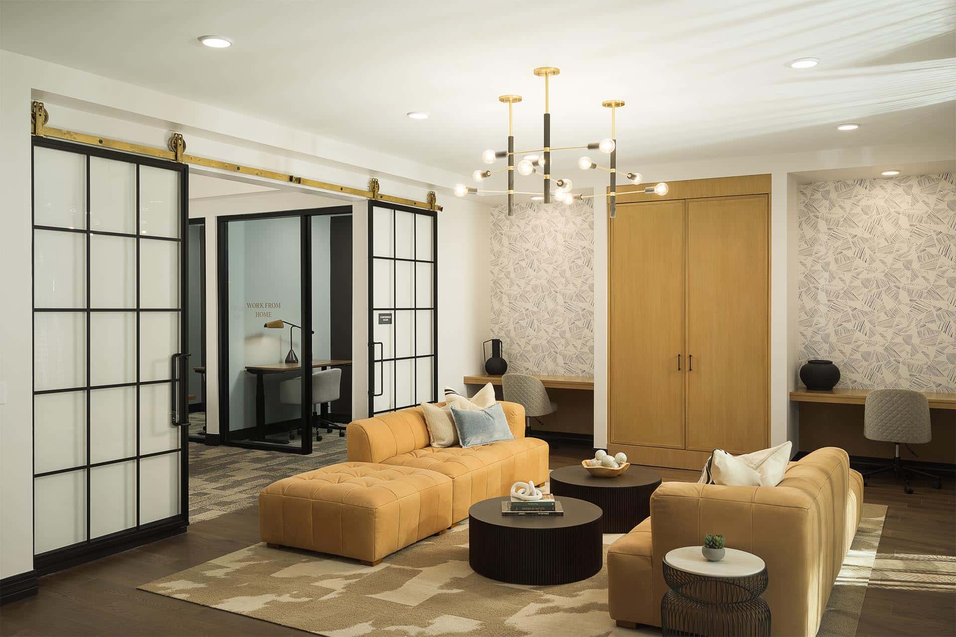 Resident space with elegant furniture and decorative lighting.